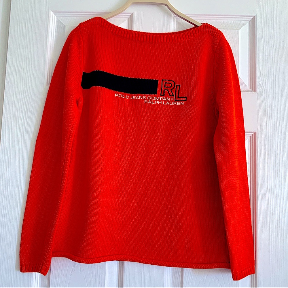 This very good condition Ralph Lauren sweater comes with style, orange & black